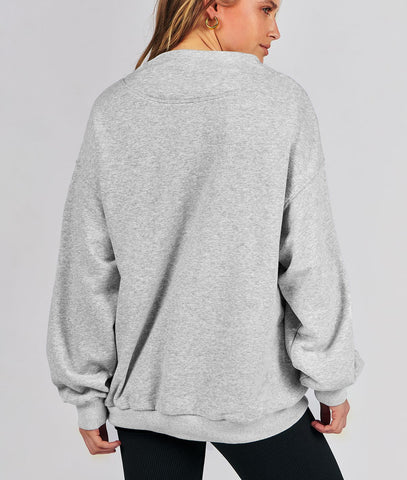 Damska bluza oversize z wycięciem pod szyją Damska bluza oversize z wycięciem pod szyją