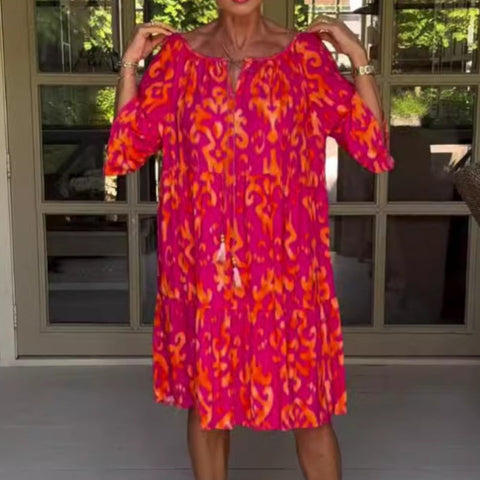 Damska luźna sukienka midi z falbaniastym dołem