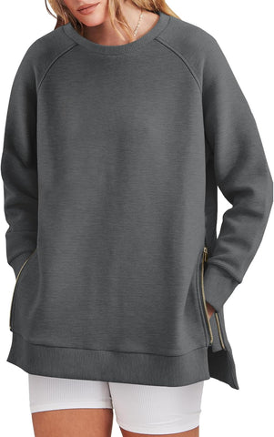 Damska bluza oversize zapinana na zamek z boku