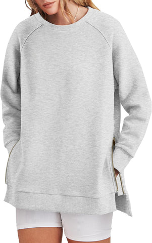 Damska bluza oversize zapinana na zamek z boku