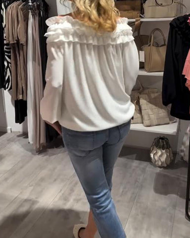 Elegancka bluzka z odkrytymi ramionami i falbanką