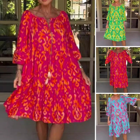 Damska luźna sukienka midi z falbaniastym dołem