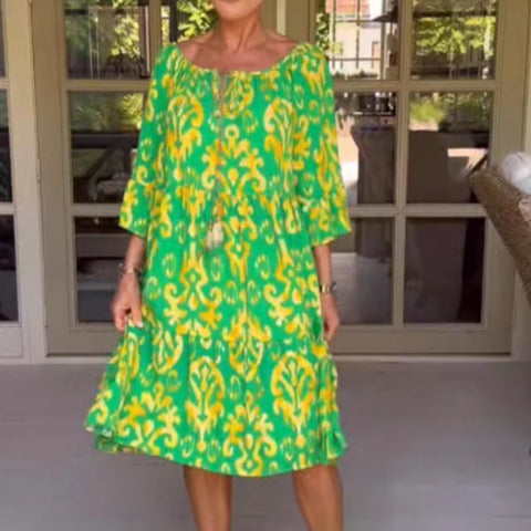 Damska luźna sukienka midi z falbaniastym dołem