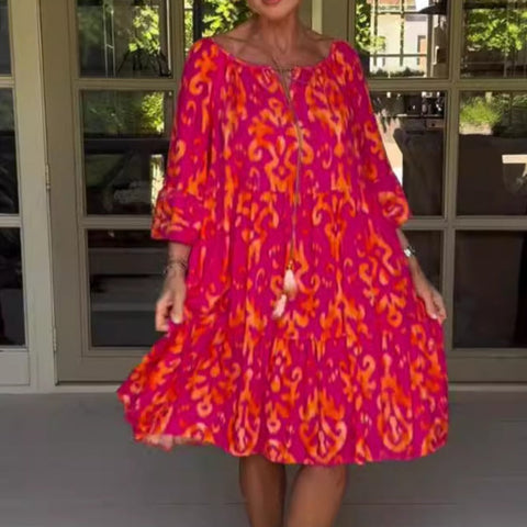 Damska luźna sukienka midi z falbaniastym dołem