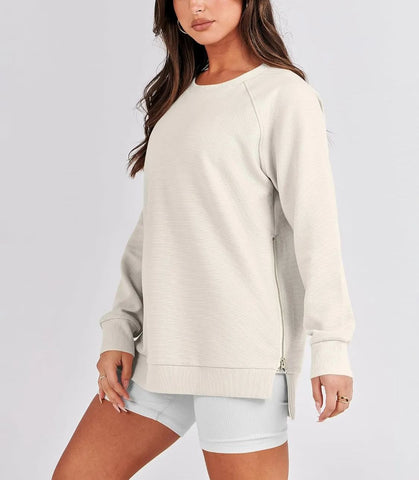 Damska bluza oversize zapinana na zamek z boku
