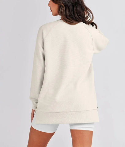 Damska bluza oversize zapinana na zamek z boku